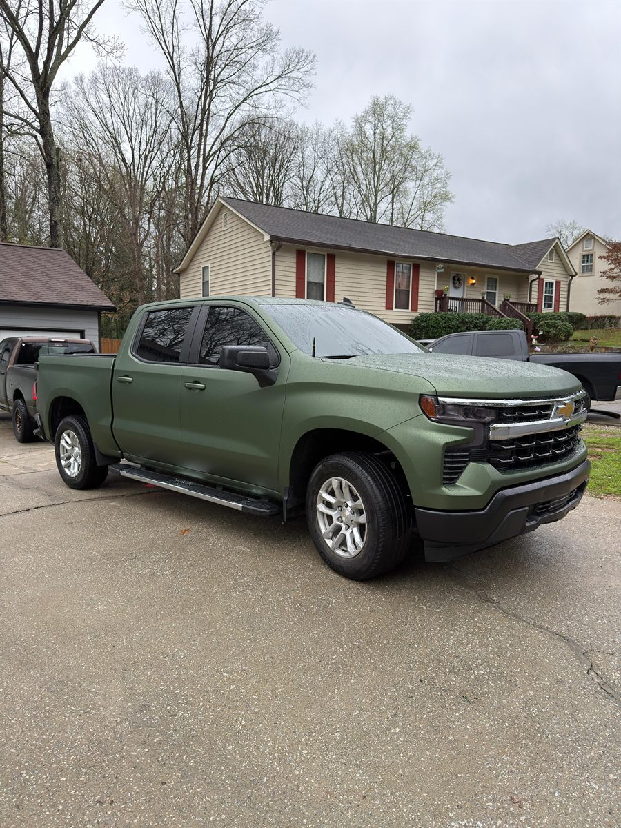 Chevrolet Silverado finished in a matte military green color change wrap